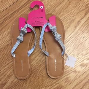 Sparkly girl flip flops with bows